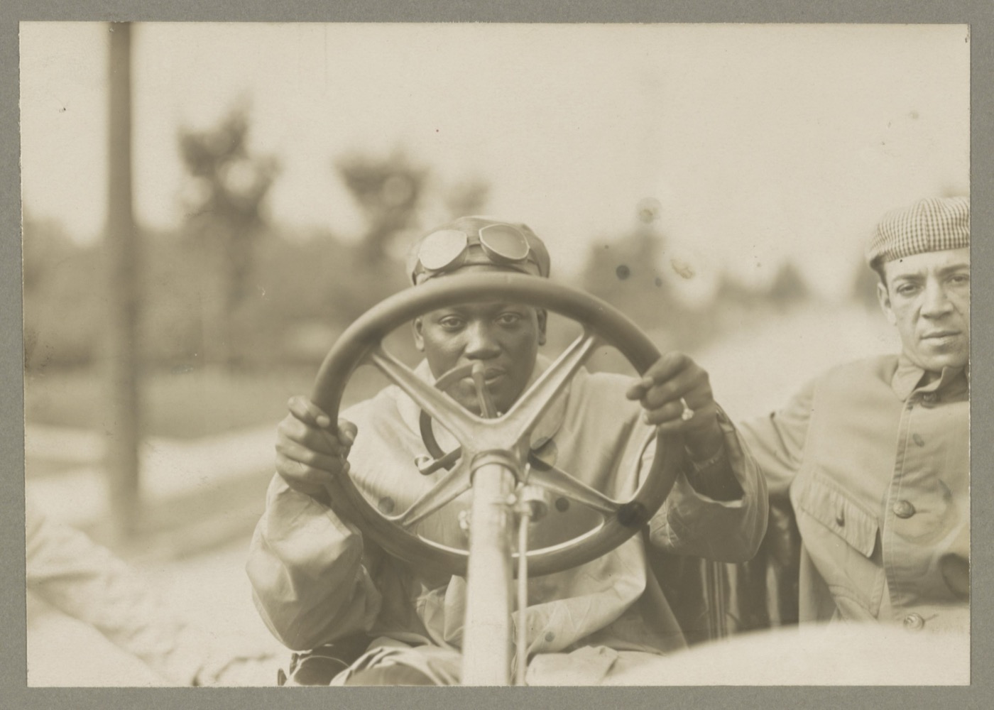 Jack Johnson at the wheel of his 90-horsepower Thomas Flyer.