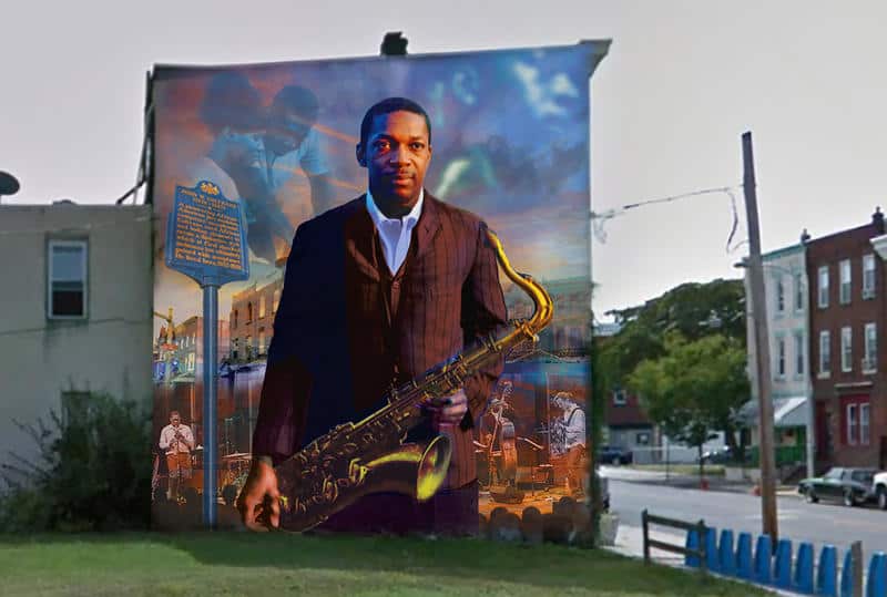 John Coltrane with his saxophone, portrayed in a Philadelphia mural by Ernel Martinez