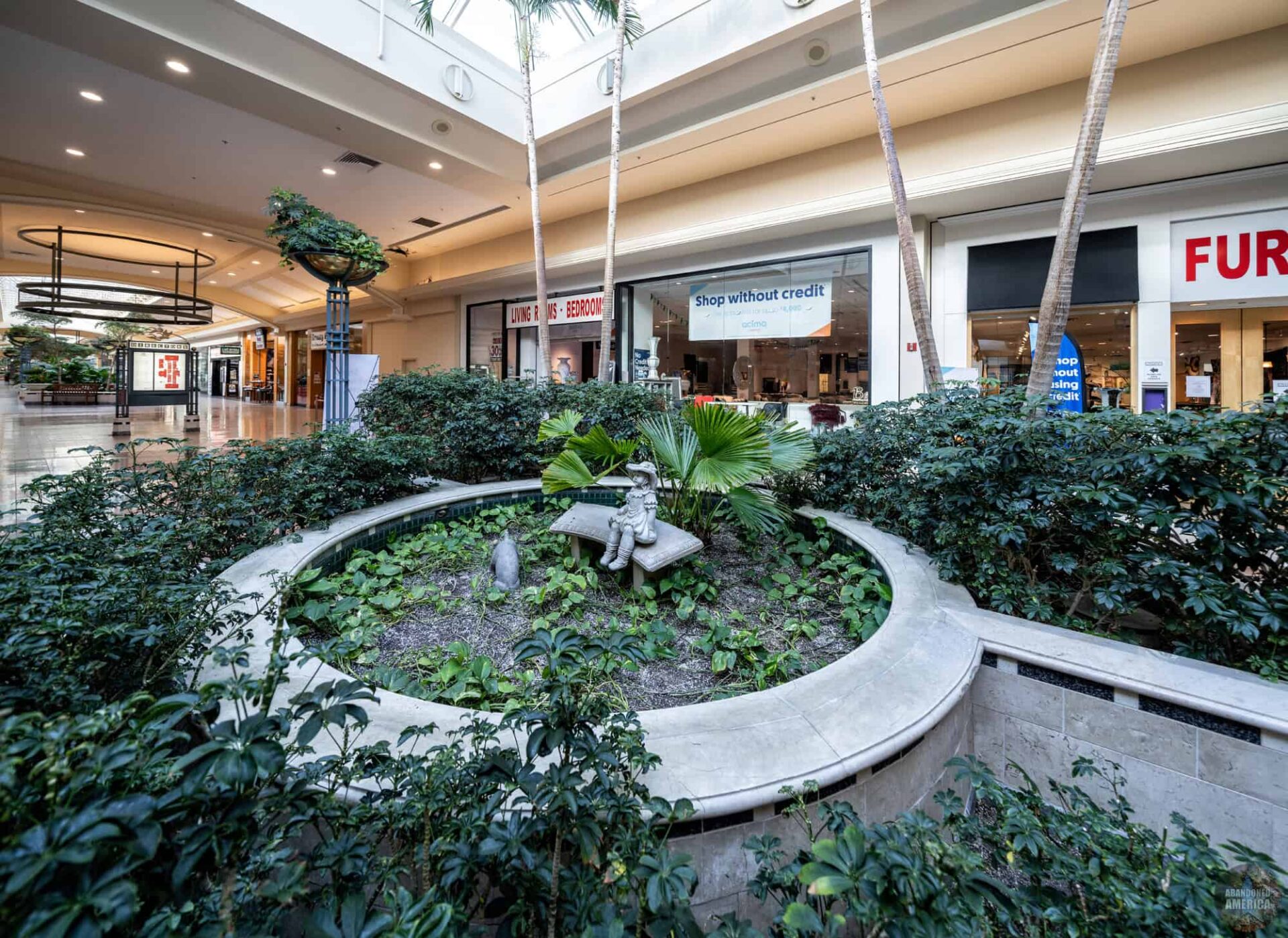 Charming details like this somewhat hidden concourse centerpiece provide a sense of discovery missing from many updated malls