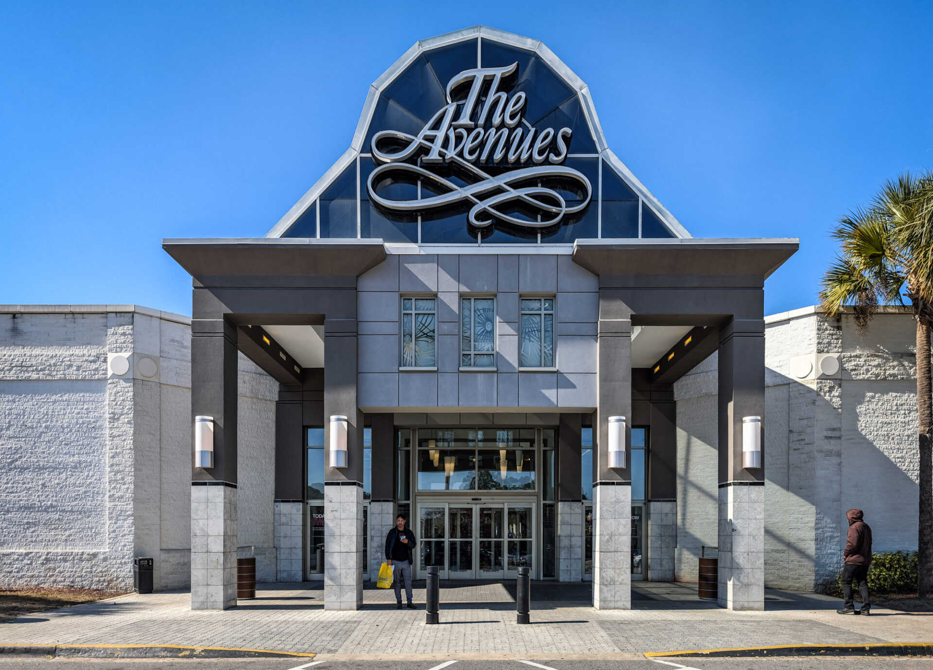 The entrance to The Avenues Mall is sleek, modern, and upscale, while remaining understated.