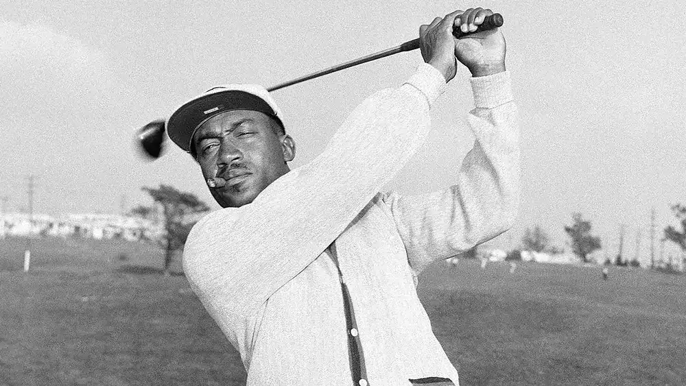 Sifford with trademark stogie