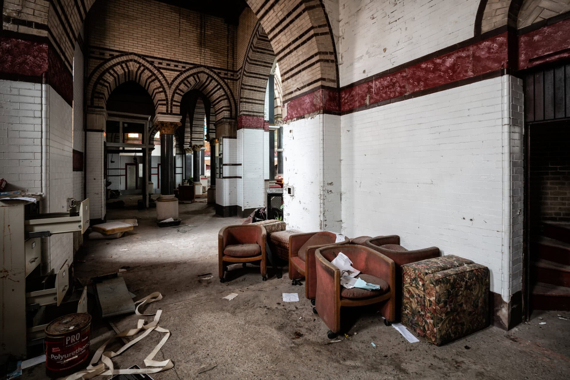 An entryway cluttered with chairs