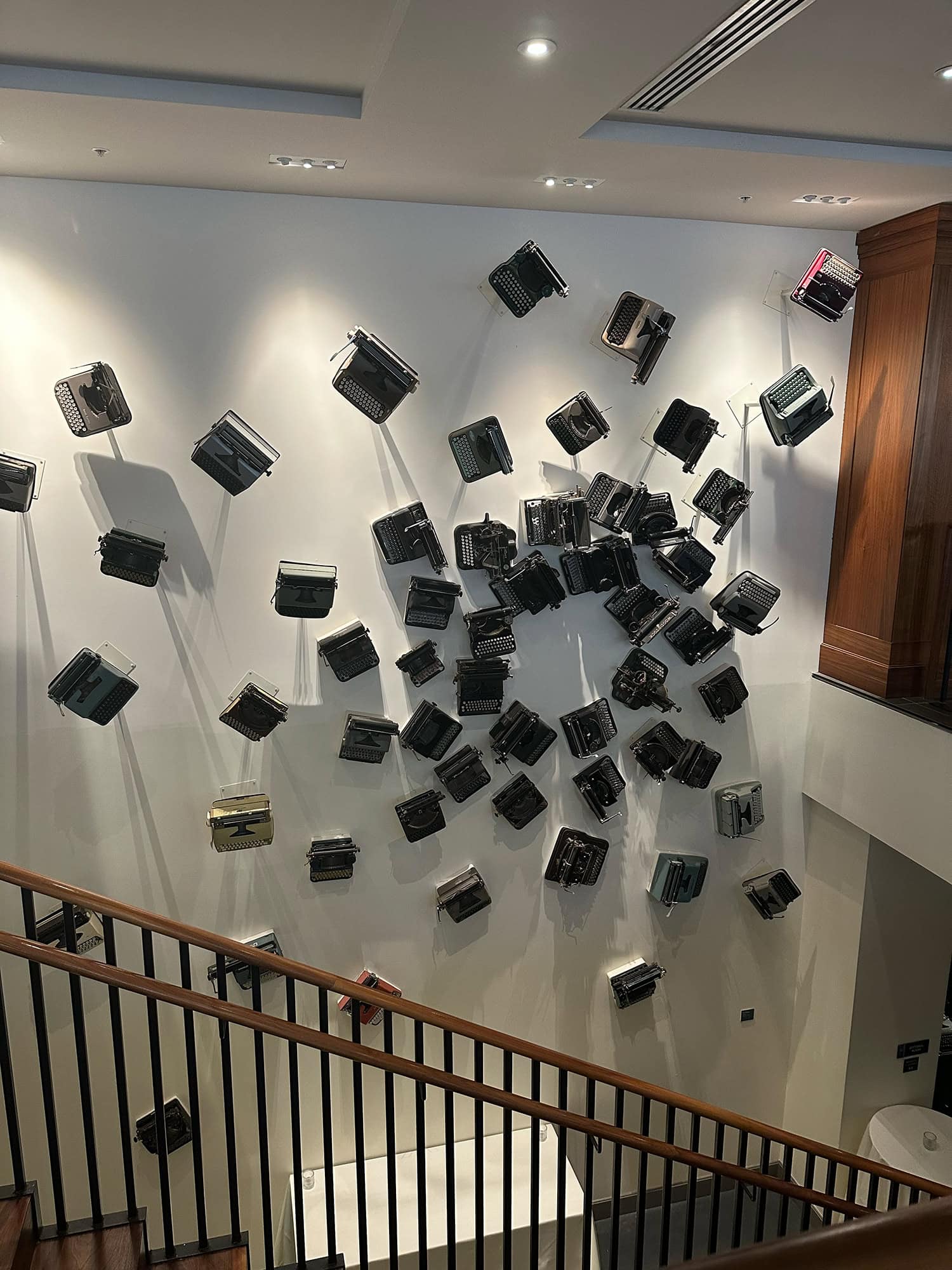 A decorative wall made out of typewriters