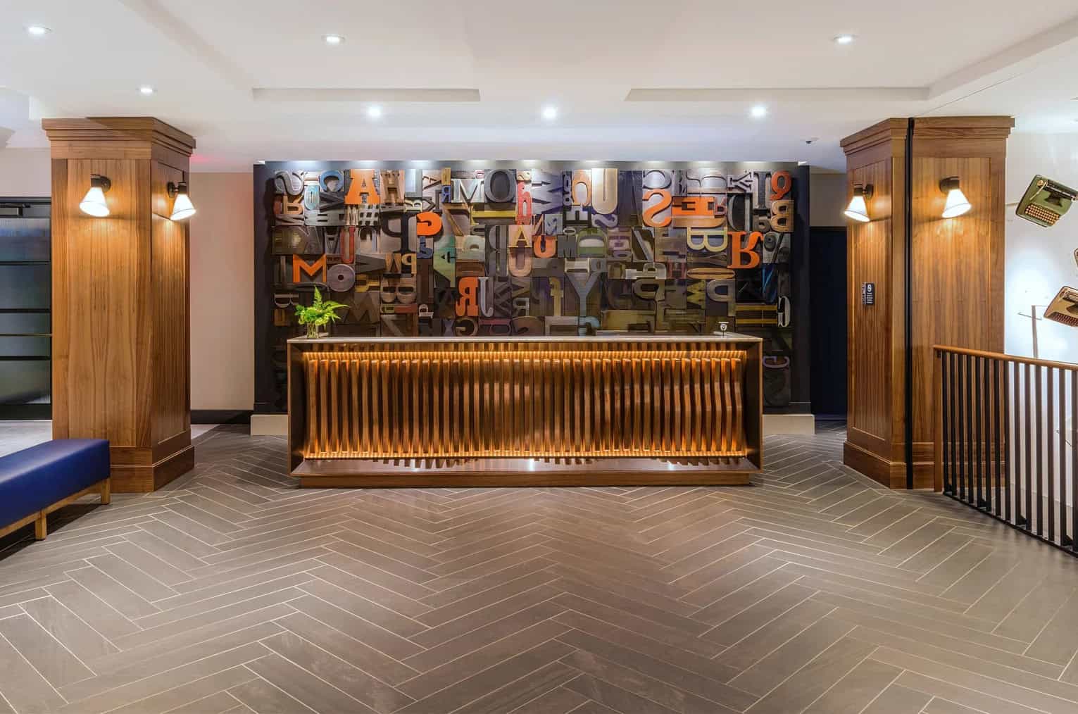 A decorative wall made out of typewriters