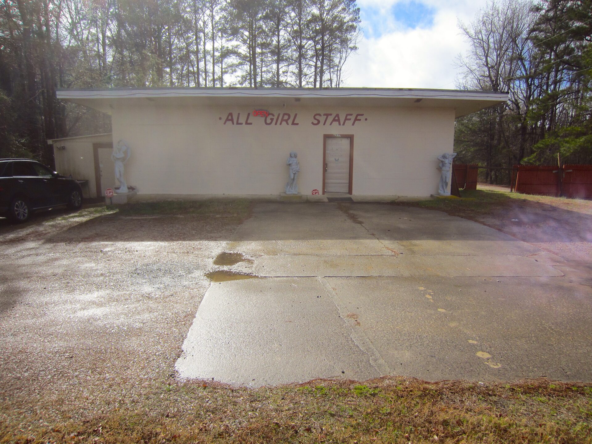 Check out the Roman statuary hidden by the red fence!