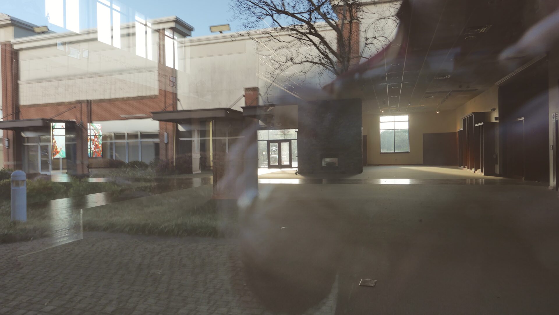Reflections at the shuttered Orvis store