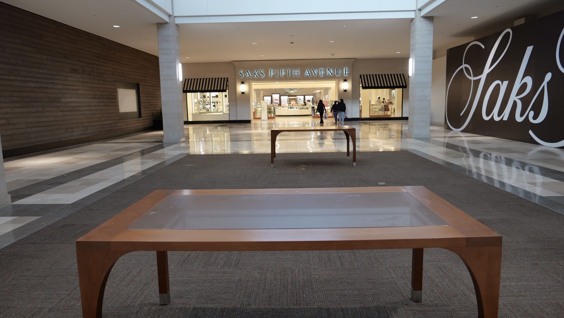 Bleak, empty, and inactive. Saks Fifth Avenue languishes prior to closure.