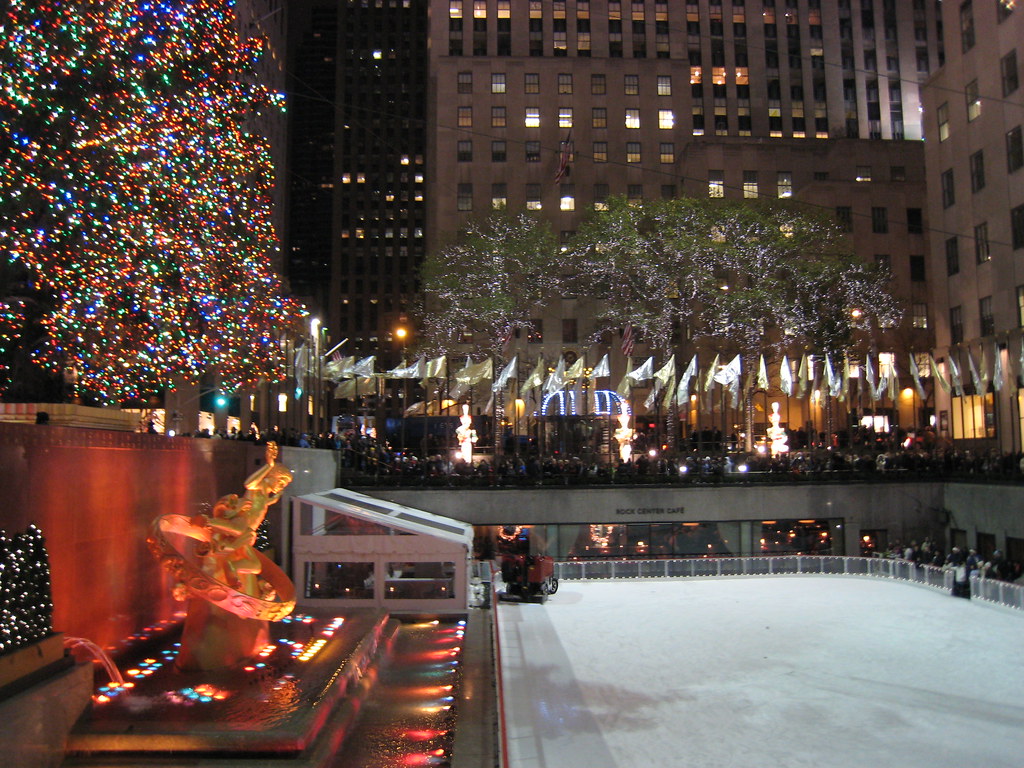 Rockefeller Center Christmas tree and ice rink at dusk