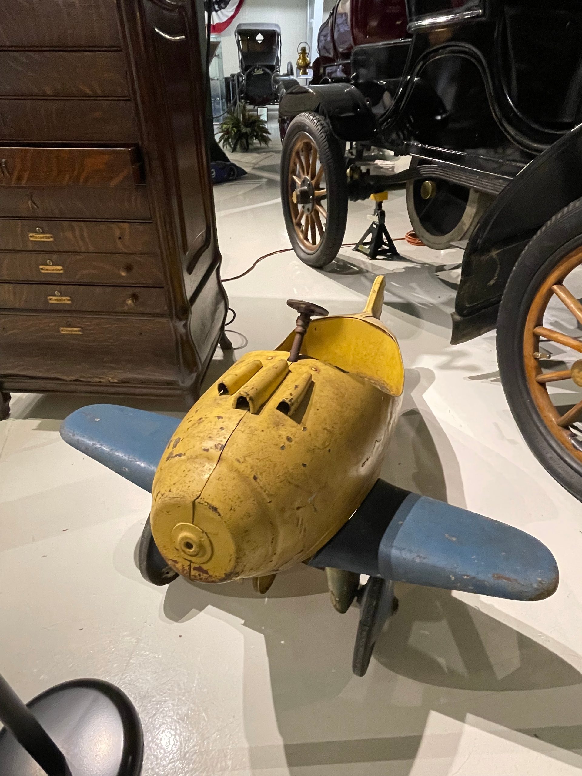 Vintage toys are part of the fun. This is a pedal car.