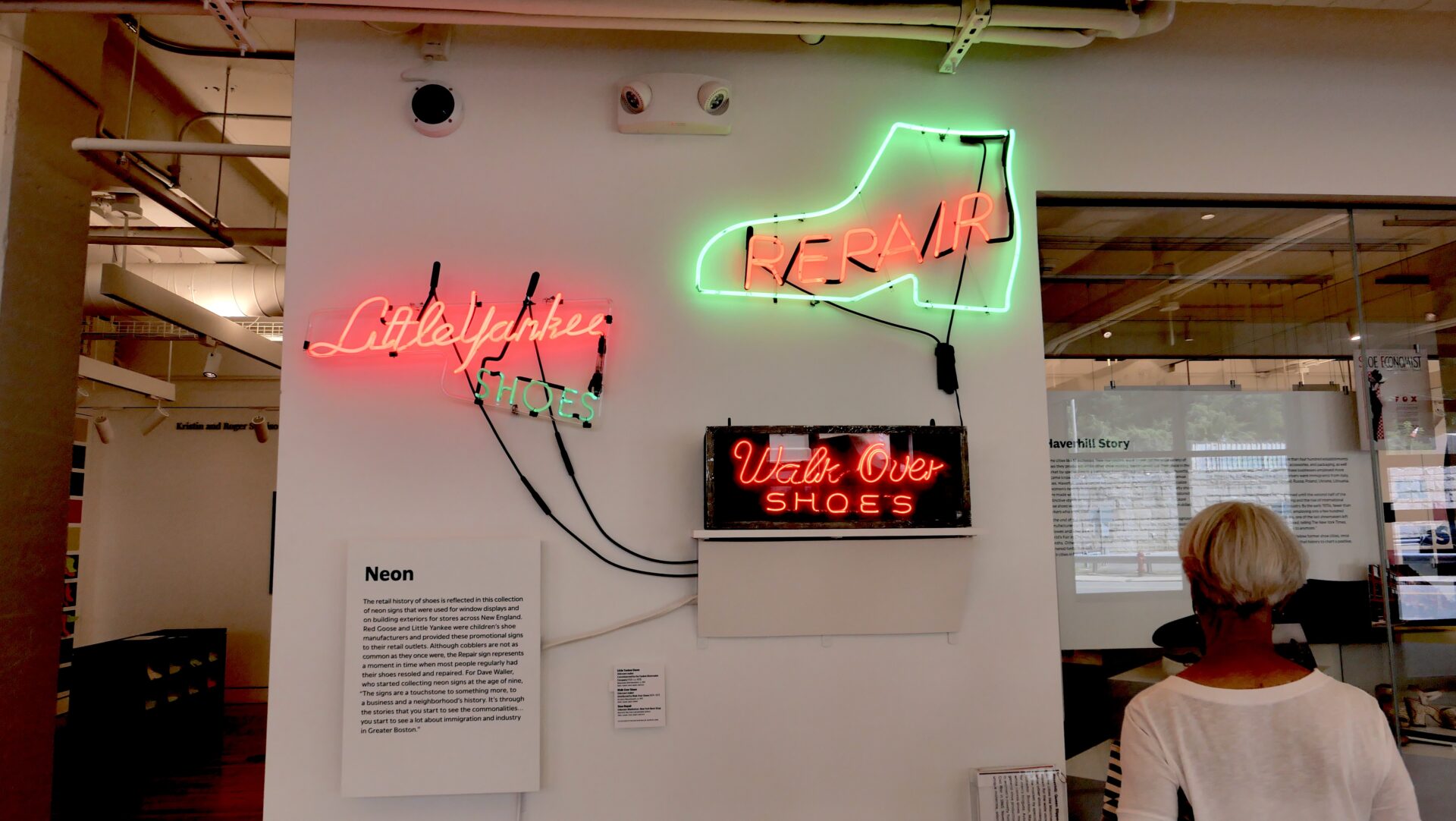 REstored neon shoe advertizing