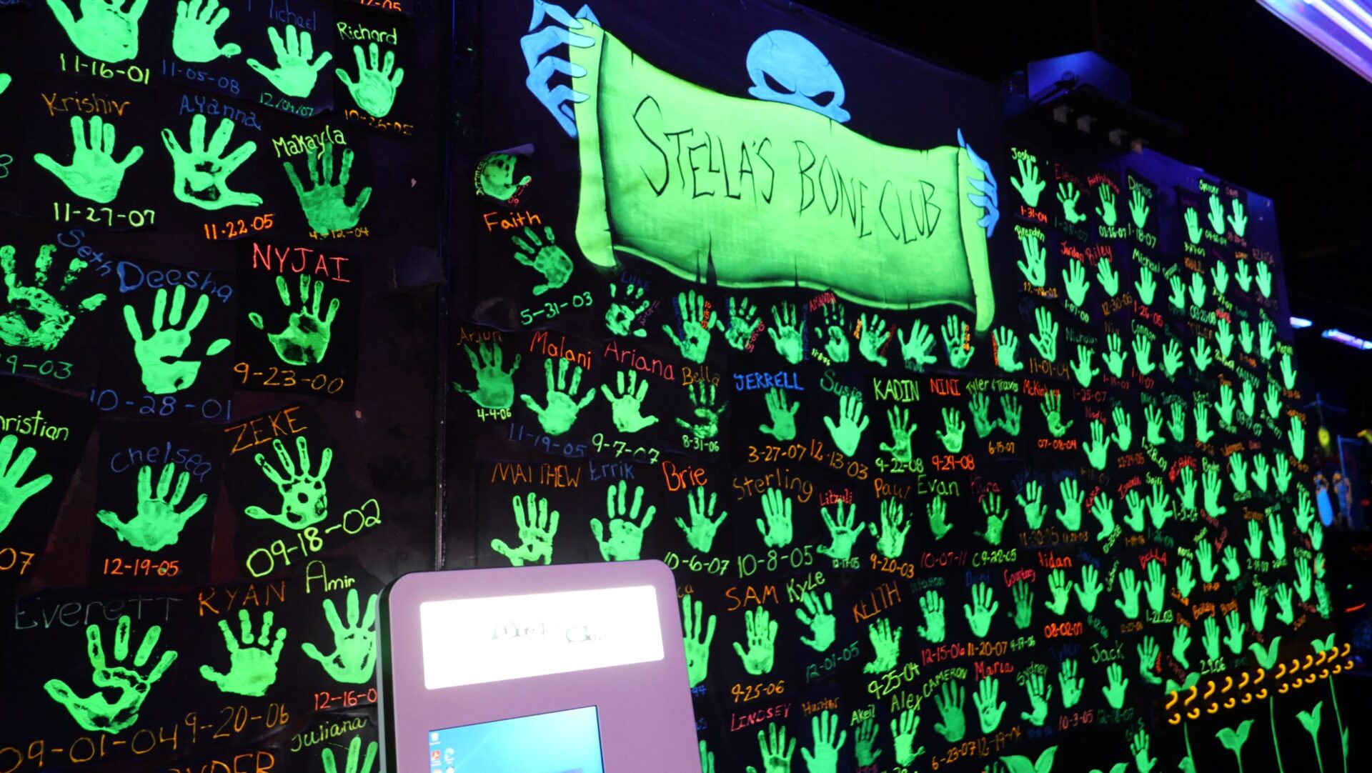 A testament to Monster Golf's popularity; customer handprints
